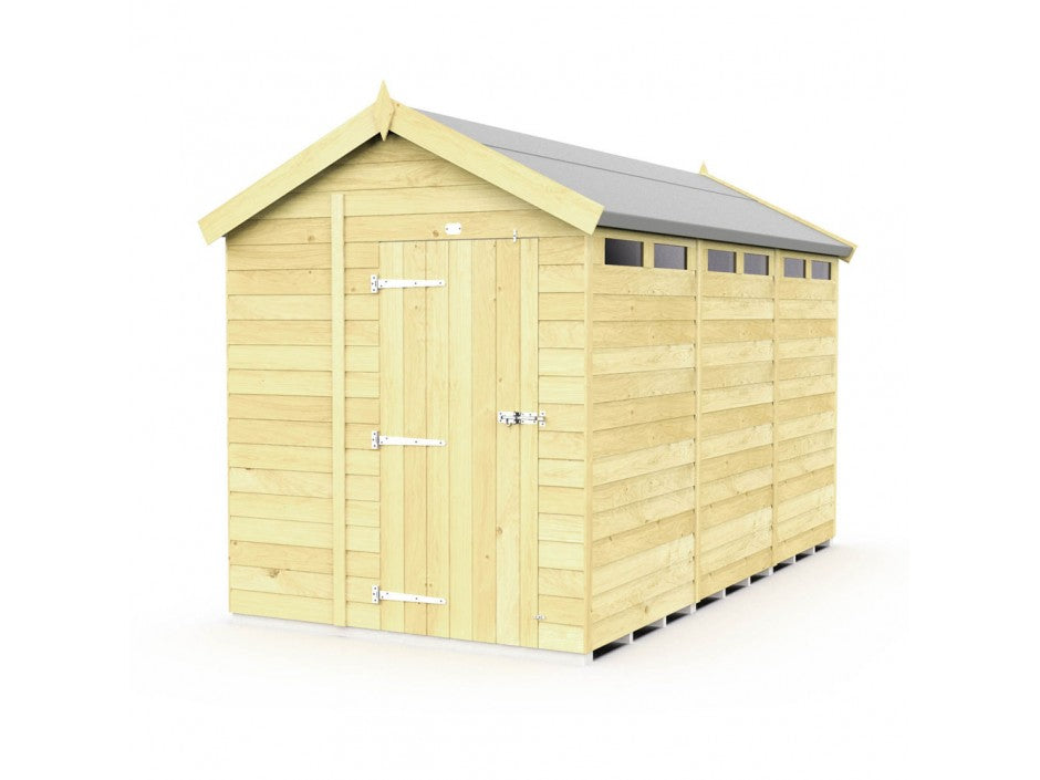 The ShedsDIY Apex Shed, 7ft wide, features a light natural finish with a gabled roof and gray shingles. Its tongue and groove design is perfect for garden storage, including a front door with left-side metal latch and hinges, plus four small rectangular windows on the top right side.