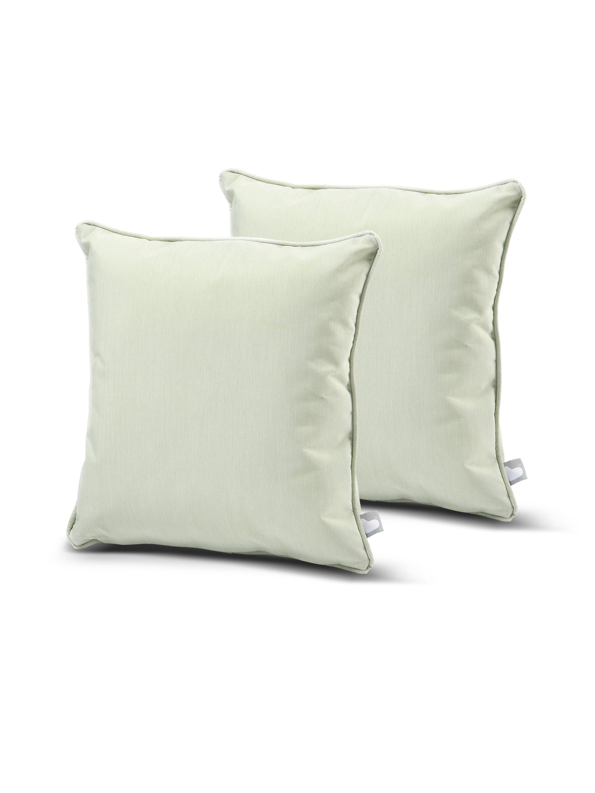 Two light green square pillows with a slightly shiny texture are placed against a white background. Each pillow has a small white tag on one of its sides. Made from splash-proof fabric, this B Cushion Twin Pack Pastel Collection by Brisks appears plush and comfortable for use on furniture.