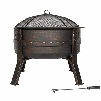 Introducing the La Hacienda Brava Firepit by La Hacienda: a round, bronze-colored firepit equipped with a mesh cover and sturdy steel legs. This firepit showcases a decorative rivet design around its exterior and comes complete with a convenient metal poker tool.