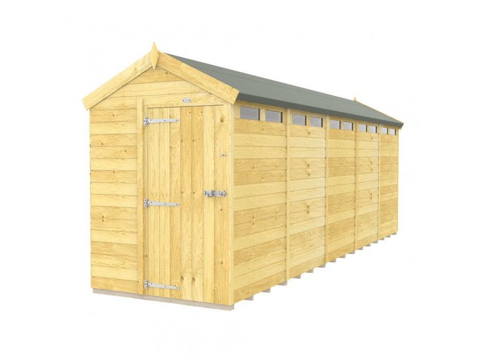 An Apex Shed 5ft Wide by ShedsDIY stands proudly in the garden with its pitched roof, single metal-hinged door, and light yellow-brown finish. Its wooden tongue and groove construction features a row of small windows near the roof on one side, adding warmth and charm.