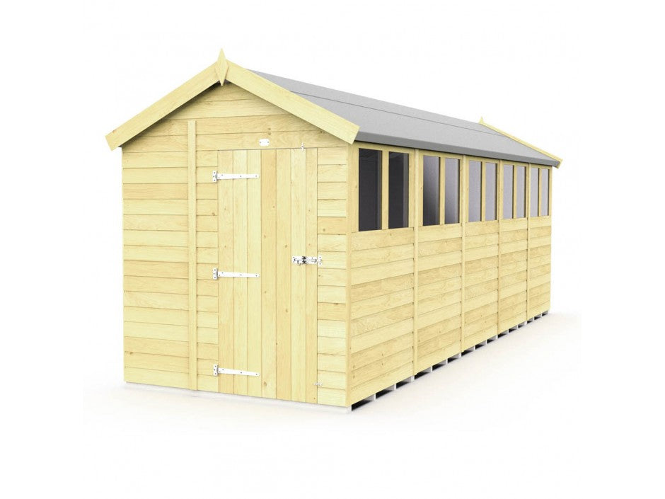 The ShedsDIY Apex Shed 6ft Wide features a light wood finish, robust single door with left-side metal hinges, multiple windows on the right, and a dark gray peaked roof with decorative ridge caps, offering both functionality and style.