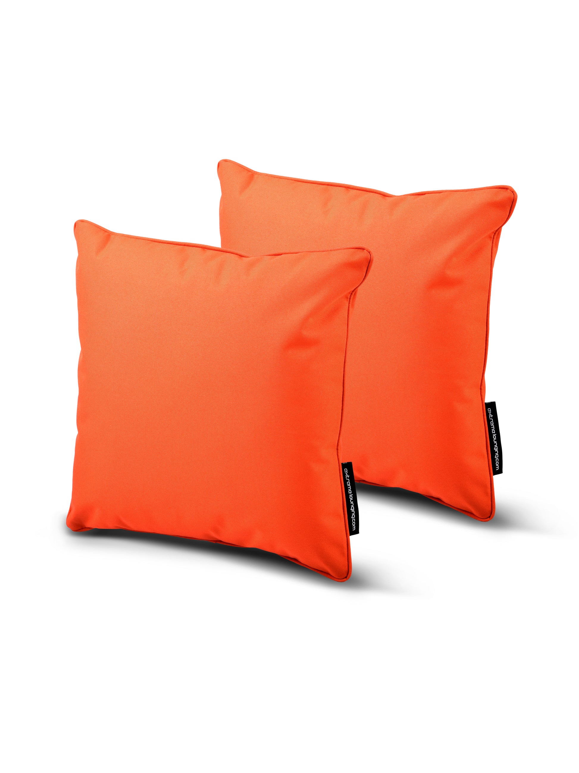 Two bright orange B Cushion Twin Pack Brights Collection pillows by Brisks, made of breathable polyester, are positioned with one slightly in front of the other against a plain white background. Each pillow has a small black tag on the side edge. The fabric appears smooth and the colors are vibrant.