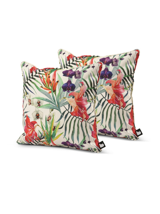 Two decorative throw pillows from Brisks featuring a vibrant tropical design with colorful flowers, green leaves, and birds. The background is white and the pattern is bold and eye-catching. Made with UV resistant, splash-proof fabric, the B Cushion Twin Pack Art Collection provides a tropical and summery feel.
