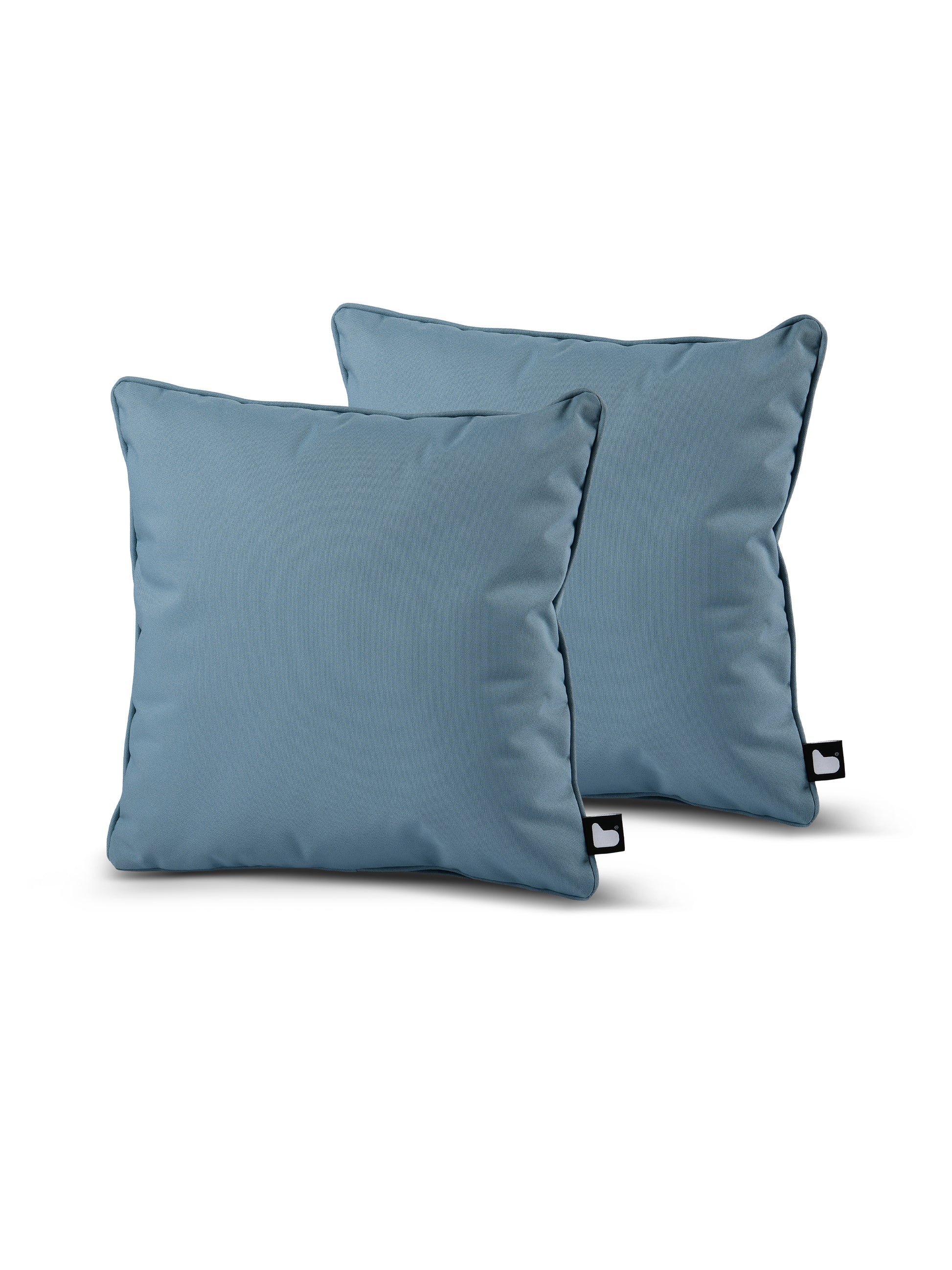 Two square blue throw pillows, made of breathable polyester, are displayed against a white background. Both pillows have a subtle texture and a small black tag on one edge. They are slightly overlapped, with the front pillow showing more prominently. These are the B Cushion Twin Pack Brights Collection by Brisks.