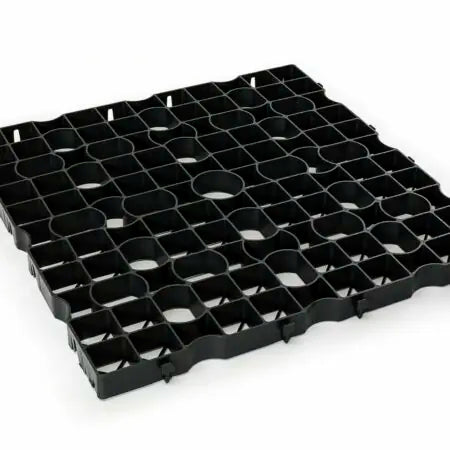 The CORE GRASS 50 by Core LP, an 800 x 800mm panel for commercial traffic, is made from recycled HDPE with interlocking squares and circular cutouts. Its textured surface offers durability and rigidity, perfect for heavy-duty vehicle access.