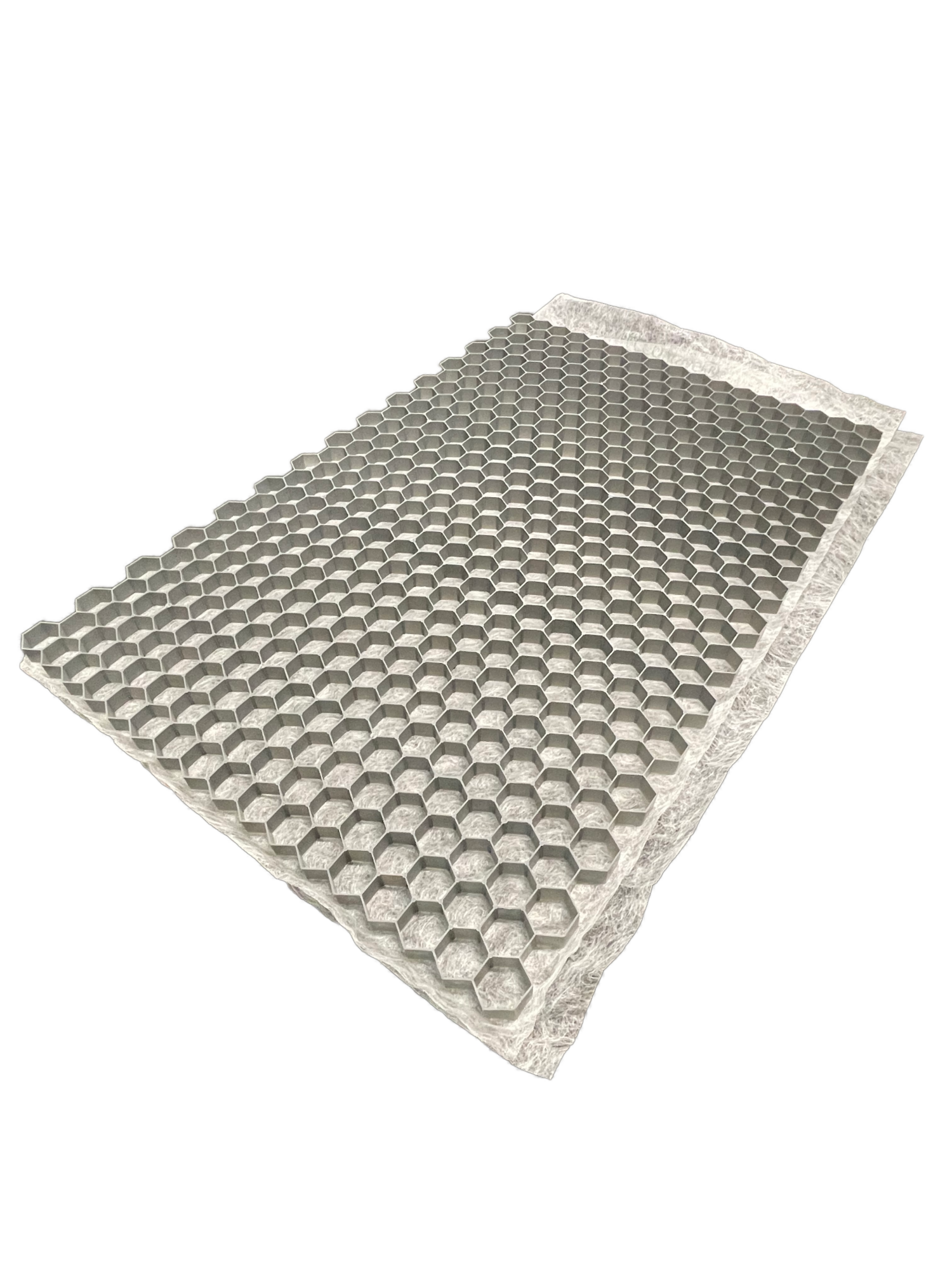 The CORE DRIVE 40-30 / 40-40 - Gravel Grid by Core LP is a rectangular sheet with a 3D honeycomb hexagonal structure for gravel stabilization. One end is partially elevated for a perspective view, and the edges form a contrasting flat band.