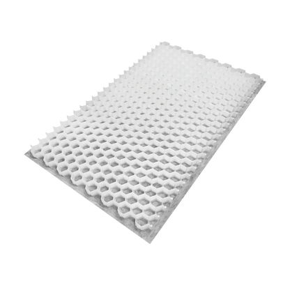 The CORE DRIVE 50-35 - Gravel Grid from Core LP features a white honeycomb pattern with a prominent 3D texture, creating a detailed geometric design. Made from recyclable HDPE, it showcases eco-friendly innovation against a plain background to highlight its unique structure.