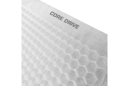 Close-up of a white surface displaying a 3D hexagonal pattern, similar to gravel stabilization grids, with "CORE DRIVE" from Core LP in the upper right corner.