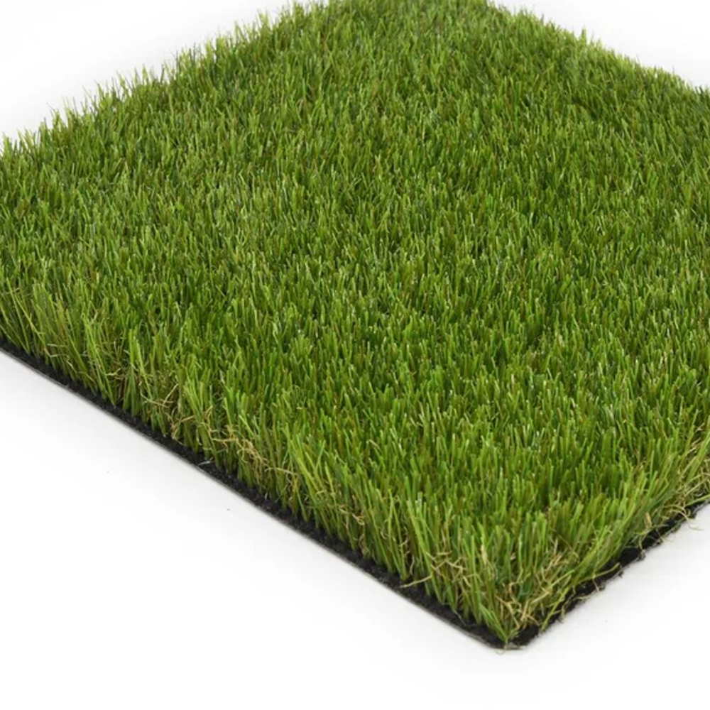 The Deck&Grass Budget Artificial Grass sample, with dense green blades and dark backing, stands upright and looks realistic, resembling neatly trimmed grass. Available in 30mm, 38mm, or 40mm heights per m².