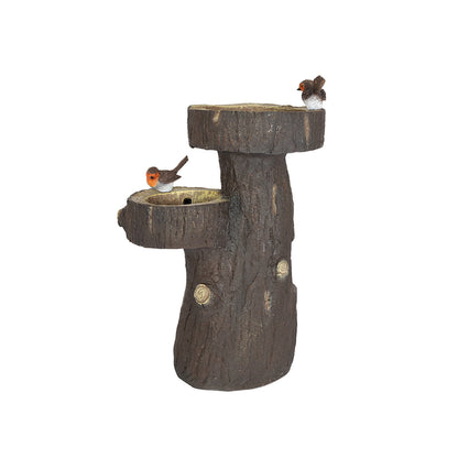 The Robin Springs incl LEDs by La Hacienda is a decorative birdbath fountain designed to resemble a tree trunk, featuring two tiers each embellished with red-breasted birds that mimic robins. This delightful garden water feature showcases a realistic bark texture and detailed carvings, bringing a natural touch to any outdoor space.