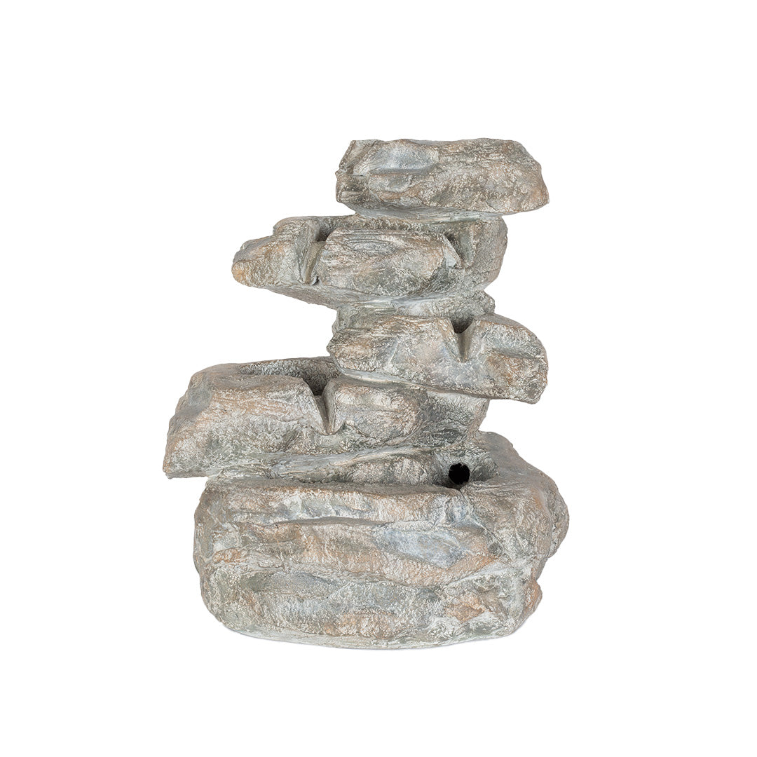 Discover tranquility with the La Hacienda Cascading Rocks incl LEDs, a solar-powered garden fountain expertly designed to replicate stacked natural rocks. It includes multiple tiers for smooth water flow, and its gray surfaces showcase a textured, weathered look that enhances the allure of natural stone.