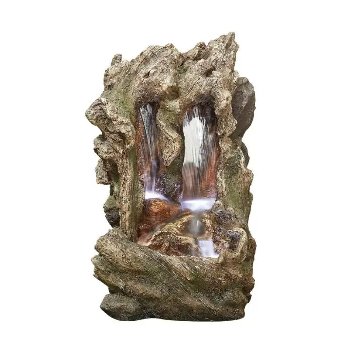 The La Hacienda Colorado Falls inc LEDS garden water feature beautifully emulates a natural waterfall with water flowing gracefully down two vertical crevices into a pool at the base. This exquisite piece is crafted from hand-painted resin and enhanced with soft lighting for a stunning effect.