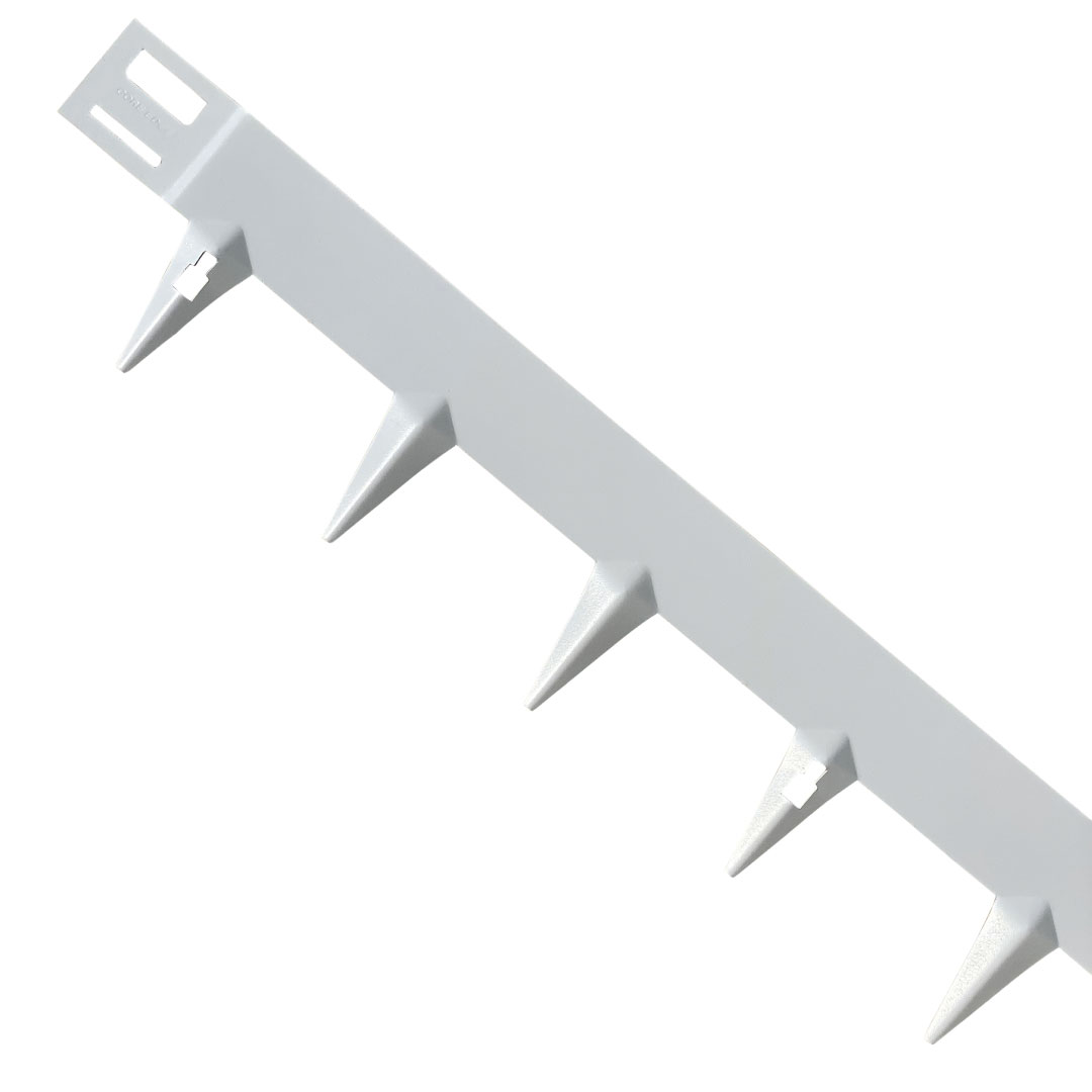 Core LP's CORE EDGE lawn edging features metal anti-climb security spikes with a light grey finish, shown diagonally on a white background. The durable spikes, spaced along a straight metal strip, deter intruders when installed on fences or walls. Available in 65mm/100mm/150mm sizes (5 x 1075mm pack).