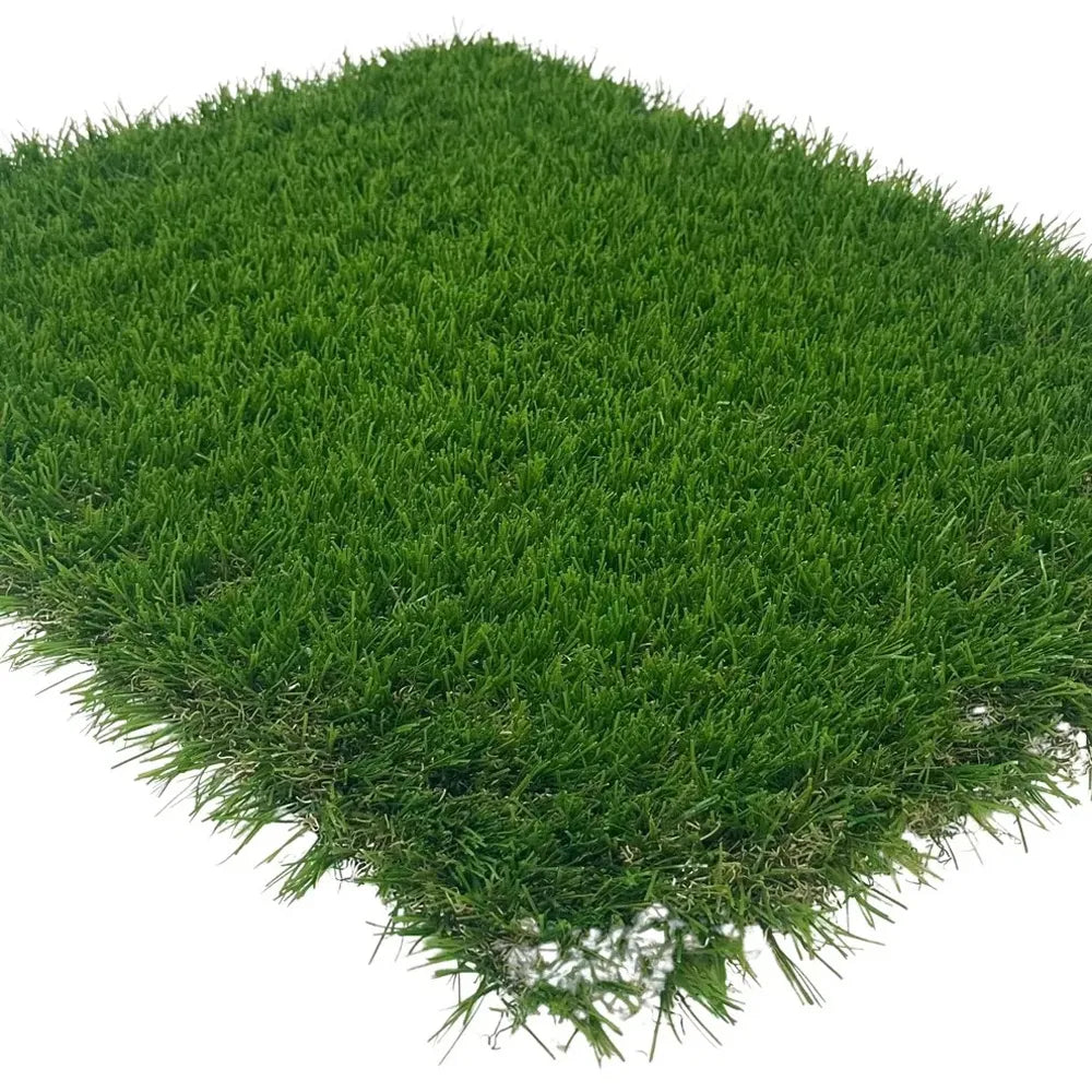 The Premium Artificial Grass by Deck&Grass, available in 30mm, 40mm, or 50mm (per m2), features dense and even blades. This UV-resistant mat provides a lush year-round look with minimal maintenance, perfect for effortlessly enhancing your outdoor space.