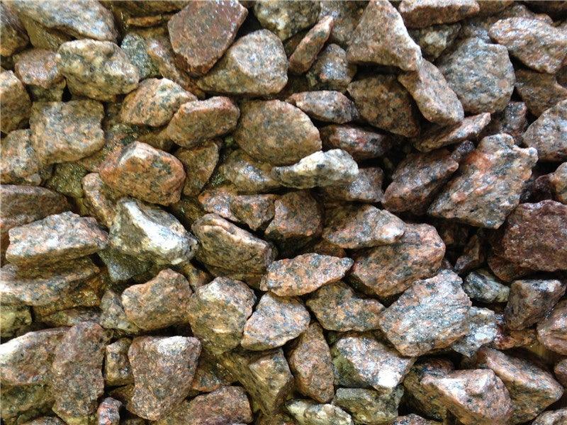 a pile of rocks that are brown and white