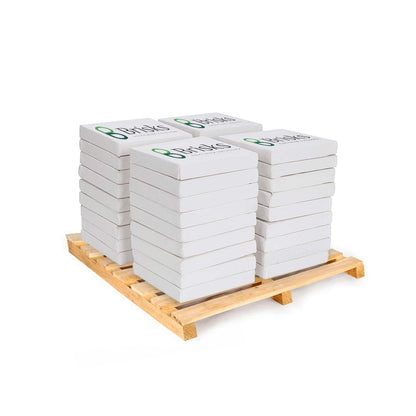 A wooden pallet holding four stacks of white "Mortar Mix Concrete" packages, each stack consisting of six ready-to-use packages. Each package has the logo of "Brisks" on the top. The stacks are evenly spaced and neatly arranged on the pallet, perfect for efficient concrete work. The background is plain white.