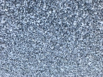 A close-up view of a large collection of small, Brisks 20mm Polar Blue Marble Chippings, spread out to cover the entire frame. The stones are irregularly shaped and vary slightly in size, creating a textured surface perfect for garden landscaping.