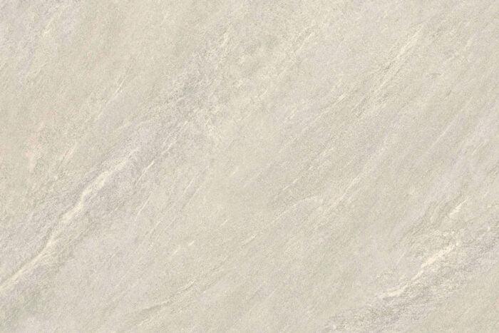 A close-up of Brisks Ultra Aspen Bianco Porcelain Paving Tiles in a light gray stone finish with subtle veining and texture, resembling natural marble or granite. Ideal for outdoor settings, the pattern is mostly uniform with slight variations, giving it a natural and elegant appearance.