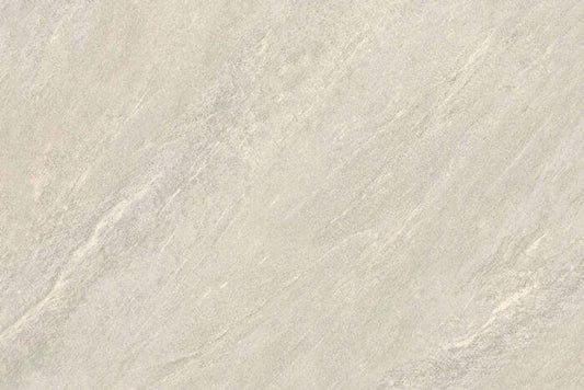 A close-up of Brisks Ultra Aspen Bianco Porcelain Paving Tiles in a light gray stone finish with subtle veining and texture, resembling natural marble or granite. Ideal for outdoor settings, the pattern is mostly uniform with slight variations, giving it a natural and elegant appearance.