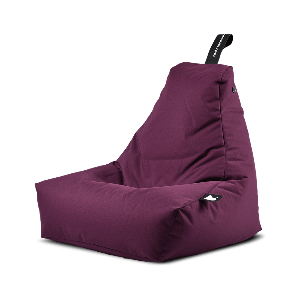 A plush, purple bean bag chair with a high backrest and a black strap at the top. The Brisks Extreme Lounging Outdoor Monster B-Bag features a simple, modern design with a rectangular base and a comfortable seat made from premium quality fabric. Durable and comfortable, it's perfect for any setting.