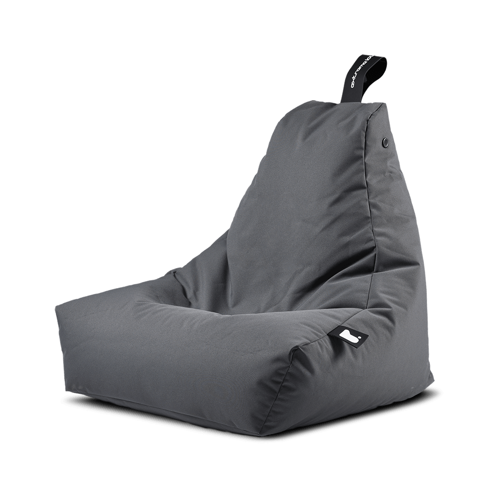 A gray Extreme Lounging B-Bag Mighty bean bag chair from Brisks with an angled backrest and a black handle at the top. The chair is modern in design, made of premium quality fabric with a soft exterior and a white logo tag on the bottom corner. It is designed for comfort, casual seating, and easy maintenance.