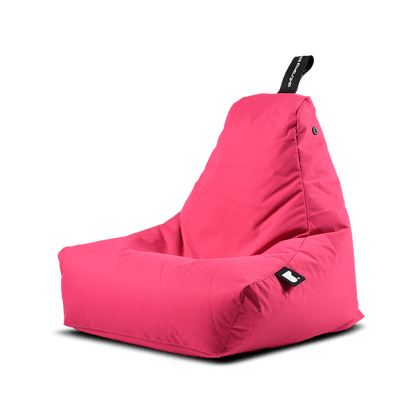 A bright pink Extreme Lounging Outdoor Mini B-Bag by Brisks with a triangular, supportive backrest. It features a black handle at the top, likely for easy carrying, and a small black tag with white stitching on one side. The premium-quality fabric appears to be durable and comfortable for lounging.