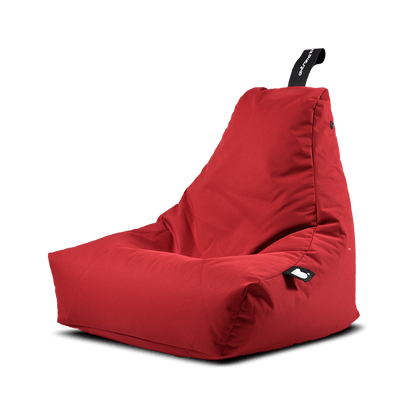 A red Brisks Extreme Lounging Outdoor Mini B-Bag featuring a high backrest and a handle for easy carrying. Made from premium quality fabric, this chair boasts a modern, slightly angular design. It's ideal for comfortable seating, relaxation, and even extreme lounging outdoors with its durable and comfortable build.