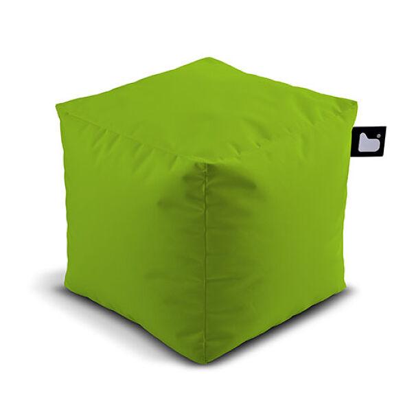 A bright green cube-shaped Extreme Lounging Outdoor B-Box, filled with polystyrene beads, features a soft fabric exterior. The Extreme Lounging Outdoor B-Box, by Brisks, has slightly rounded edges and corners, giving it a plush appearance. A small black tag with a white heart icon is attached to one corner of this perfect addition to your garden retreat.